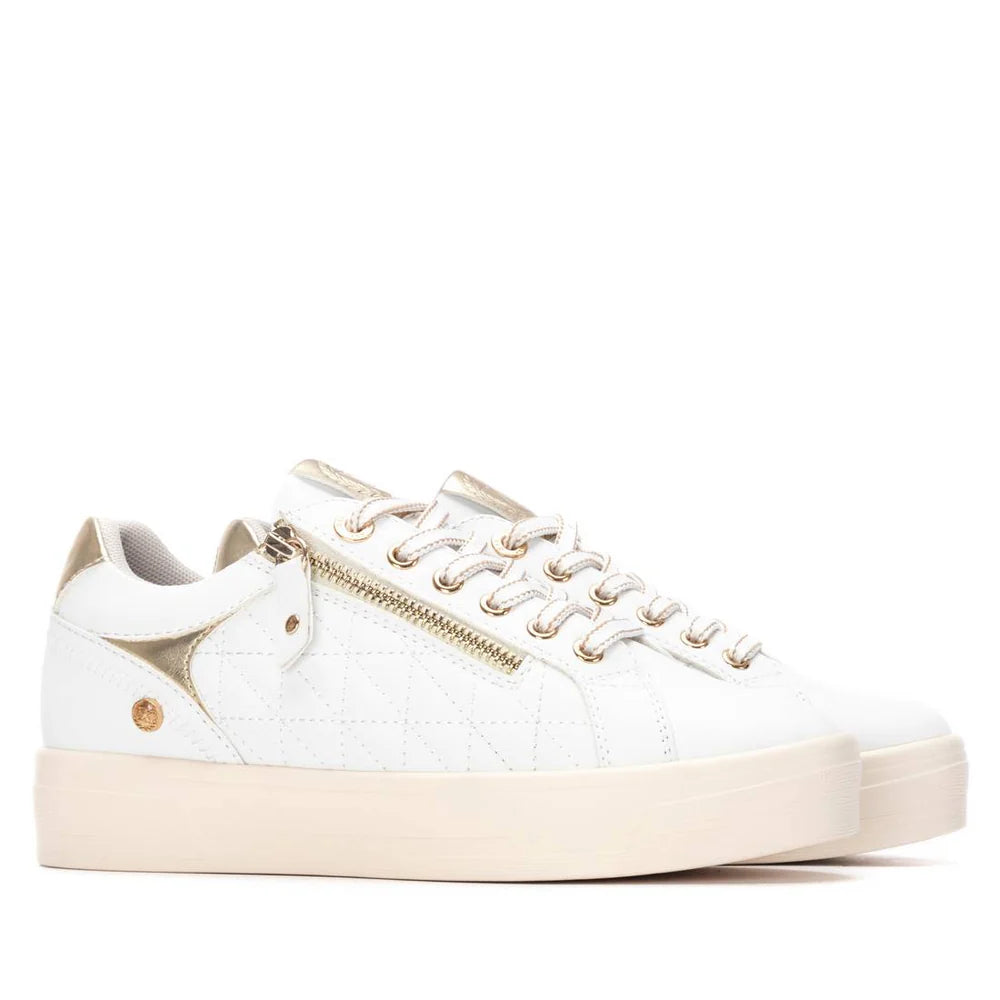 Sneakers in ecopelle bianche